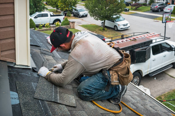 Professional Gutter Repair And Installation technician working in Fairview, NC